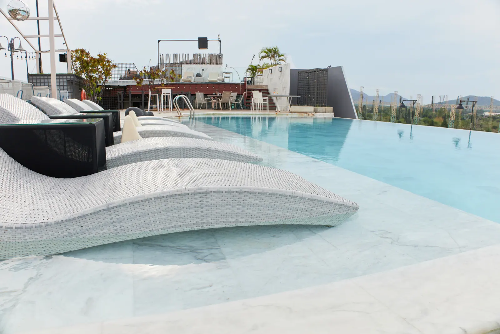 Rooftop pool with in-water loungers
