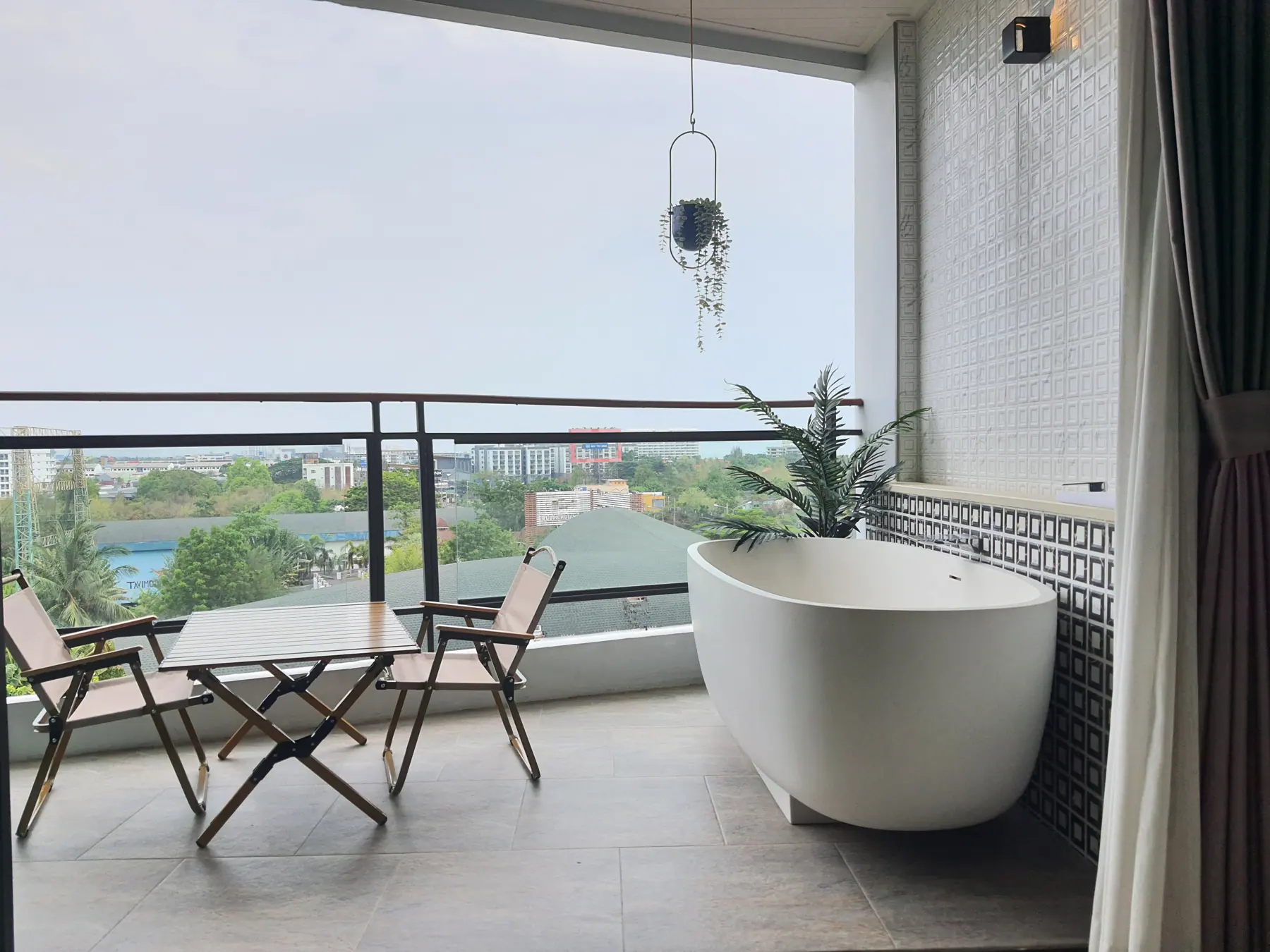 Premier High Floor balcony with a freestanding bathtub