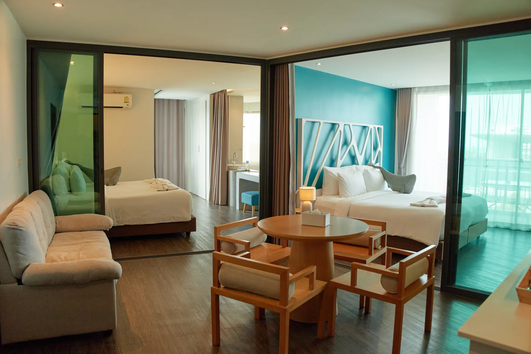 Family suite living area opening onto the bedroom