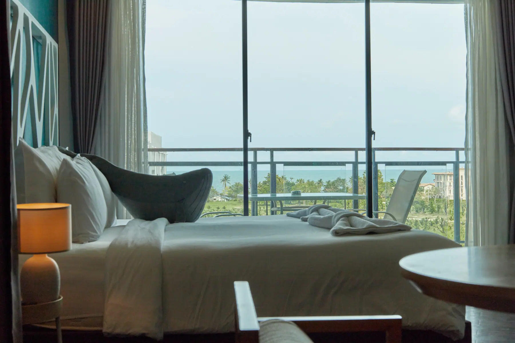 Spacious bedroom with a sea view